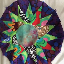 I have finished the compass.  I changed the center to use some of Ricky's hand dyed fabric.