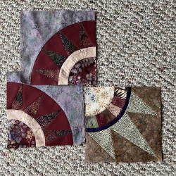 Block #1 complete.  I found two orphan blocks in my stash, so chose fabrics to coordinate with them.  Perhaps this project will become a quilt.