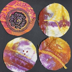 Hand dyed and painted button covers.