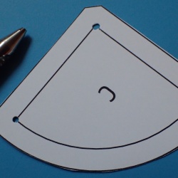 Eyelet punch used for making dot holes in homemade templates.