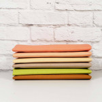 Bella Solids Fat Quarter Bundle by Moda Fabrics - Cantaloupe